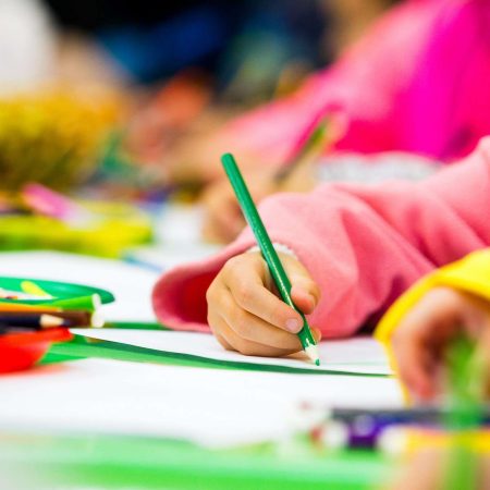 Pencil in the child's hand